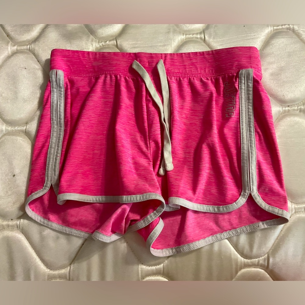 Pink JUSTICE shorts.